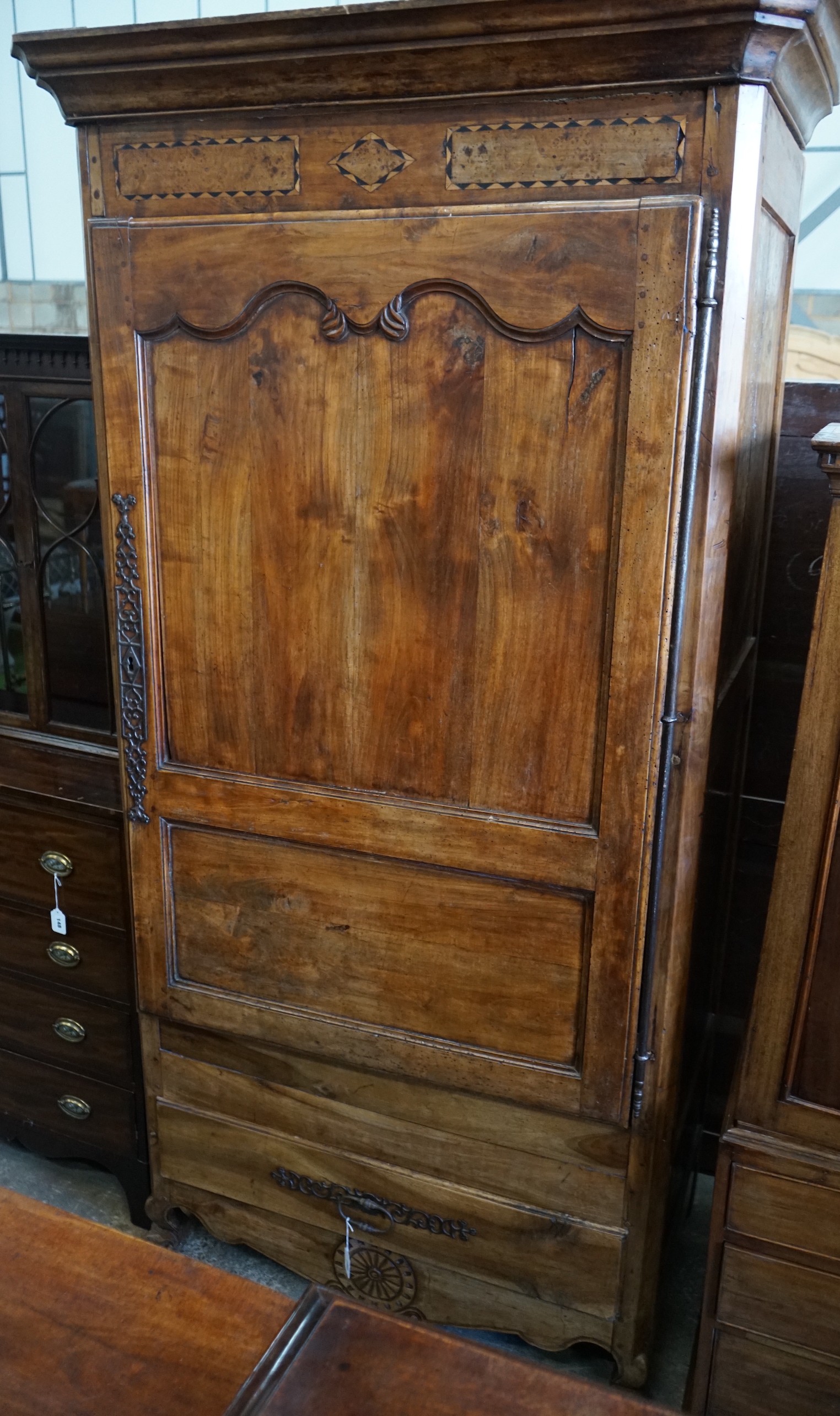 An early 19th century French parquetry inlaid walnut armoire, length 116cm, depth 69cm, height 227cm